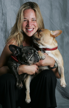 Patty Khuly holding two dogs Patty Khuly holding two dogs